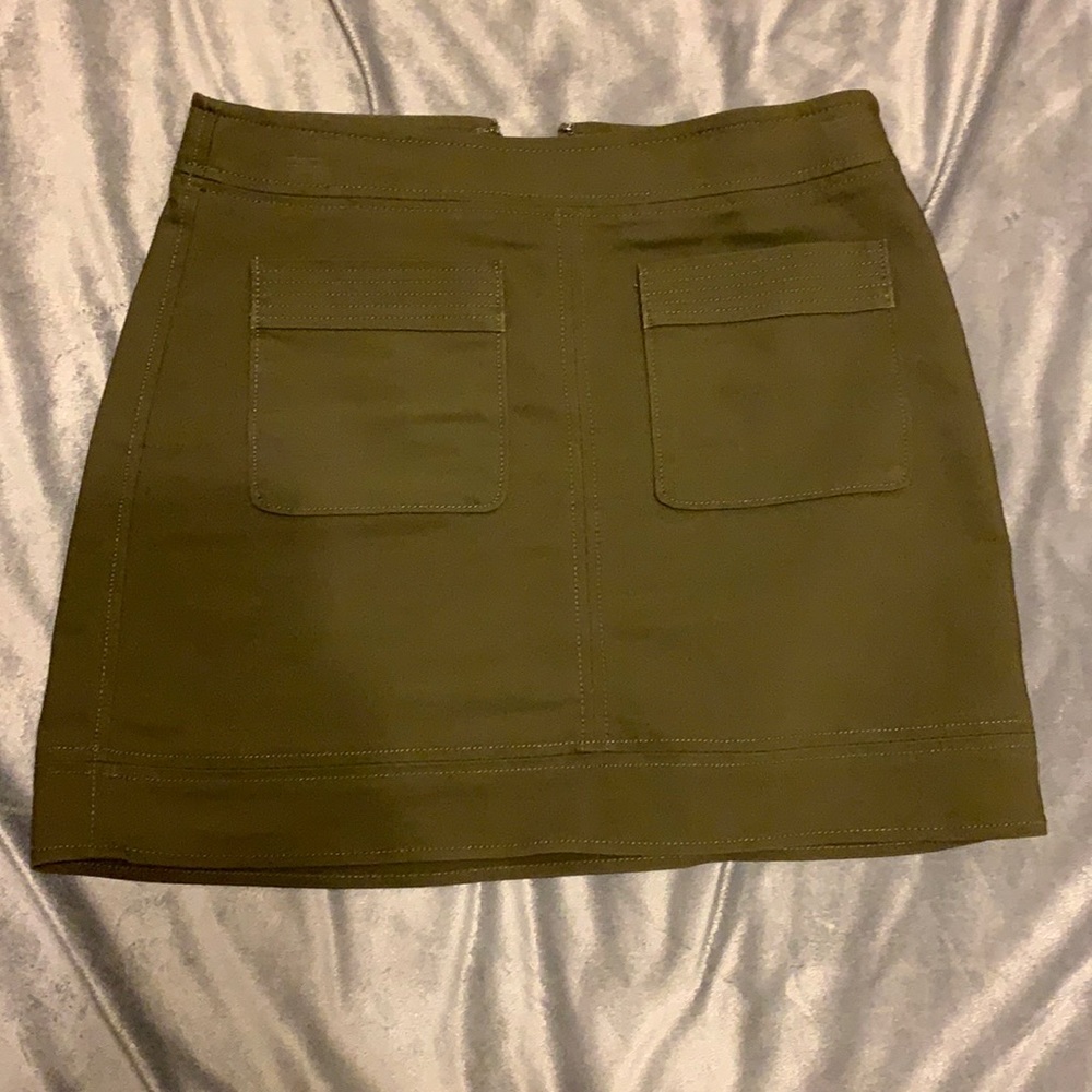 Express fall mini skirt. Super cute with high boots and oversized sweater.